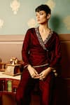 Reeti Arneja_Maroon Micro Velvet Hand Embroidered Bead Lapel V Sangria Front Tie-up Jumpsuit _Online_at_Aza_Fashions