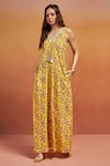 Shop_SHIKHA MALIK_Yellow 100% Cotton Print Floral V Neck Embellished Neckline Jumpsuit _Online_at_Aza_Fashions