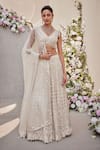 Buy_SAISHA_Ivory Organza Embroidered Dabka V-neck Tonal Floral Bridal Lehenga Set _at_Aza_Fashions