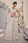 SAISHA_Ivory Organza Embroidered Dabka V-neck Tonal Floral Bridal Lehenga Set _at_Aza_Fashions