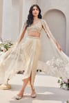 Buy_SAISHA_Ivory Organza Embroidered Sequin Cape Zardozi Ruffled Hem Dhoti Skirt Set _at_Aza_Fashions