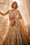 Swish By Dolcy And Simran_Beige Net Embroidered Cutdana Athena 3d Sequin Floral Bridal Lehenga Set _Online_at_Aza_Fashions