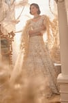 Shop_Swish By Dolcy And Simran_Ivory Net Embroidered Cutdana Demeter Floral Pearl Lehenga With Blouse _at_Aza_Fashions