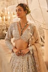 Shop_Swish By Dolcy And Simran_Green Net Embroidered Crystal Plunge Eos Floral Vine Sequin Bridal Lehenga Set _at_Aza_Fashions