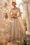 Buy_Swish By Dolcy And Simran_Ivory Net Embroidered Luna Tonal Sequin Bridal Lehenga Set With Blouse _at_Aza_Fashions