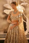 Buy_Swish By Dolcy And Simran_Gold Net Embroidered Mirror Sweetheart Minerva Bridal Lehenga Set _Online_at_Aza_Fashions