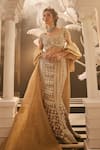 Shop_Swish By Dolcy And Simran_Gold Tissue Embroidered Lace Hera Crystal Cascade Mermaid Lehenga Set With Cape _at_Aza_Fashions