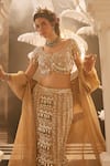 Buy_Swish By Dolcy And Simran_Gold Tissue Embroidered Lace Hera Crystal Cascade Mermaid Lehenga Set With Cape _Online_at_Aza_Fashions