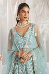 Samyukta Singhania_Blue Net Applique Floral Leaf Sequin Embroidered Lehenga Set _at_Aza_Fashions