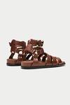 Shop_Oroh_Brown Metallic Thread Stud Gladiator Sandals _Online_at_Aza_Fashions