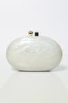 Shop Be Chic Ivory Metal Clasp Oval Clutch at Aza Fashions Shop_Be Chic_Ivory Metal Clasp Oval Clutch _at_Aza_Fashions