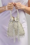 Buy_Tasna_White Cutdana Pearl Embellished Potli _at_Aza_Fashions