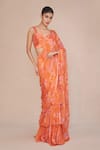 Buy_Ankita Dharman_Orange Muslin, Chiffon Sweetheart Neck Floral Printed Pre-draped Ruffle Saree _at_Aza_Fashions