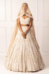 Buy_Isha Regalia_Beige Net, Satin Pearls, Sequins Round Floral Embroidered Bridal Lehenga Set _at_Aza_Fashions