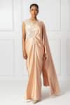 Isha Regalia_Peach Net, Satin Pearls, Sequins, Embellished Pre-draped Saree And Bodysuit Set _Online_at_Aza_Fashions