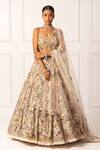 Buy_Isha Regalia_Beige Satin, Net Sequins, Beads Halter Neck, Floral Vine Embroidered Lehenga Set _at_Aza_Fashions