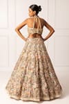 Isha Regalia_Beige Satin, Net Sequins, Beads Halter Neck, Floral Vine Embroidered Lehenga Set _Online_at_Aza_Fashions