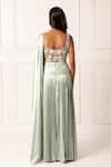 Shop_Isha Regalia_Green Net, Satin Pearls, Sequins, Embellished Pre-draped Saree And Bodysuit Set _at_Aza_Fashions
