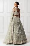 Shop_Isha Regalia_Green Net, Satin Mirrors, Sequins Sweetheart Neck Mint Work Lehenga Set _at_Aza_Fashions