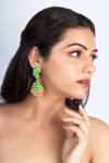 Buy Bauble Bazaar Yellow Pearls, Tassels Clover Bloom Dangler Earrings at Aza Fashions Buy_Bauble Bazaar_Yellow Pearls, Tassels Clover Bloom Dangler Earrings _at_Aza_Fashions