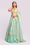 Buy_Blue Lotus Design_Blue Raw Silk Printed Bead Sweetheart Floral Lehenga Set _at_Aza_Fashions