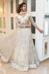 Buy_RONAK AND SHRUTI_Ivory Net Feathers, Embroidery, Crystals, Sequins, Stones V-neck Lehenga Set _at_Aza_Fashions