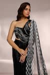 Label Moni K_Black Net, Georgette, Lycra Sequins One Metallic Embellished Pre-draped Saree _at_Aza_Fashions