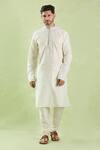Buy_Samyukta Singhania_Cream Kurta Poly Silk Plain Set With Churidar _Online_at_Aza_Fashions