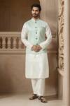 Buy_Arihant Rai Sinha_Green Brocade, Silk Embroidery Floral Woven Bundi Kurta Set _at_Aza_Fashions