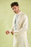 Samyukta Singhania_Cream Kurta Poly Silk Embroidered Thread Contrast Placket Set _at_Aza_Fashions