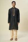 Samyukta Singhania_Black Kurta Poly Silk Embroidered Thread Vine Placket And Churidar _Online_at_Aza_Fashions