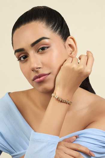 Buy_Isharya_Gold Plated Crystals Stone Studded Tennis Bracelet _at_Aza_Fashions