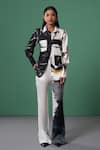 Buy_Advait_Black Satin, Twill And White Abstract Print Flared Trouser _at_Aza_Fashions