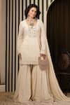 Buy_Soniya G_Ivory Georgette Embroidery, Metallic Thread, Tassels Round Chikankari Kurta Set _at_Aza_Fashions