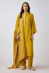 Basanti - Kapde Aur Koffee_Yellow Muslin Cut Work Round Neck Embellished Mustard Kurta Set_Online_at_Aza_Fashions
