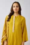 Buy_Basanti - Kapde Aur Koffee_Yellow Muslin Cut Work Round Neck Embellished Mustard Kurta Set_Online_at_Aza_Fashions