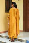 Shop_Vaayu_Yellow Muslin Cotton Embroidered Floral Applique Round Keyhole Kurta Pant Set _at_Aza_Fashions