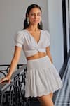 Buy_Kay Kay_White Cotton, Poplin Embroidery V-neck Knotted Crop Top And Schiffli Skirt Set _Online_at_Aza_Fashions