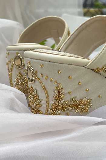 Shradha Hedau Footwear Couture_Ivory Cut Work, Sequins Beige Cutdana Floral Wedges _Online_at_Aza_Fashions
