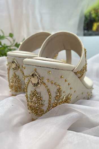 Buy_Shradha Hedau Footwear Couture_Ivory Cut Work, Sequins Beige Cutdana Floral Wedges _Online_at_Aza_Fashions