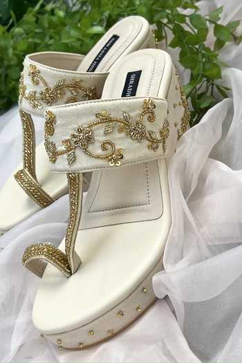 Buy_Shradha Hedau Footwear Couture_Ivory Cut Work, Sequins Beige Cutdana Floral Wedges _at_Aza_Fashions