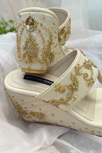 Shop_Shradha Hedau Footwear Couture_Ivory Cut Work, Sequins Beige Cutdana Floral Wedges _Online_at_Aza_Fashions