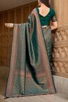 Shop_Samyukta Singhania_Green Silk Embroidery Boat Neck Floral Vine Woven Banarasi Saree And Blouse_at_Aza_Fashions