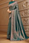 Samyukta Singhania_Green Silk Embroidery Boat Neck Floral Vine Woven Banarasi Saree And Blouse_at_Aza_Fashions