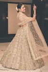 Shop_Ruchika Hurria_Ivory Net Embroidered Pearl Plunge Bridal Lehenga With Blouse Set _Online_at_Aza_Fashions