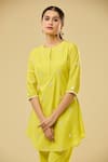 Naintara Bajaj_Yellow Chanderi Mirrors, Sequins Round Neck Butti Kurta Set _Online_at_Aza_Fashions