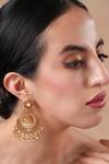 Buy Ekathva Jaipur Gold Plated Temple Carved Chandbali Jhumkas at Aza Fashions Buy_Ekathva Jaipur_Gold Plated Temple Carved Chandbali Jhumkas_at_Aza_Fashions