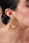 Shop Ekathva Jaipur Gold Plated Temple Carved Chandbali Jhumkas at Aza Fashions Shop_Ekathva Jaipur_Gold Plated Temple Carved Chandbali Jhumkas_at_Aza_Fashions
