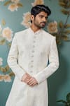Arihant Rai Sinha Off White Silk, Faux Leather Embroidery Celeste Bloom Sherwani And Churidar Online at Aza Fashions Arihant Rai Sinha_Off White Silk, Faux Leather Embroidery Celeste Bloom Sherwani And Churidar _Online_at_Aza_Fashions