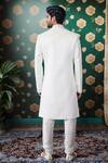 Shop Arihant Rai Sinha Off White Silk, Faux Leather Embroidery Celeste Bloom Sherwani And Churidar at Aza Fashions Shop_Arihant Rai Sinha_Off White Silk, Faux Leather Embroidery Celeste Bloom Sherwani And Churidar _at_Aza_Fashions